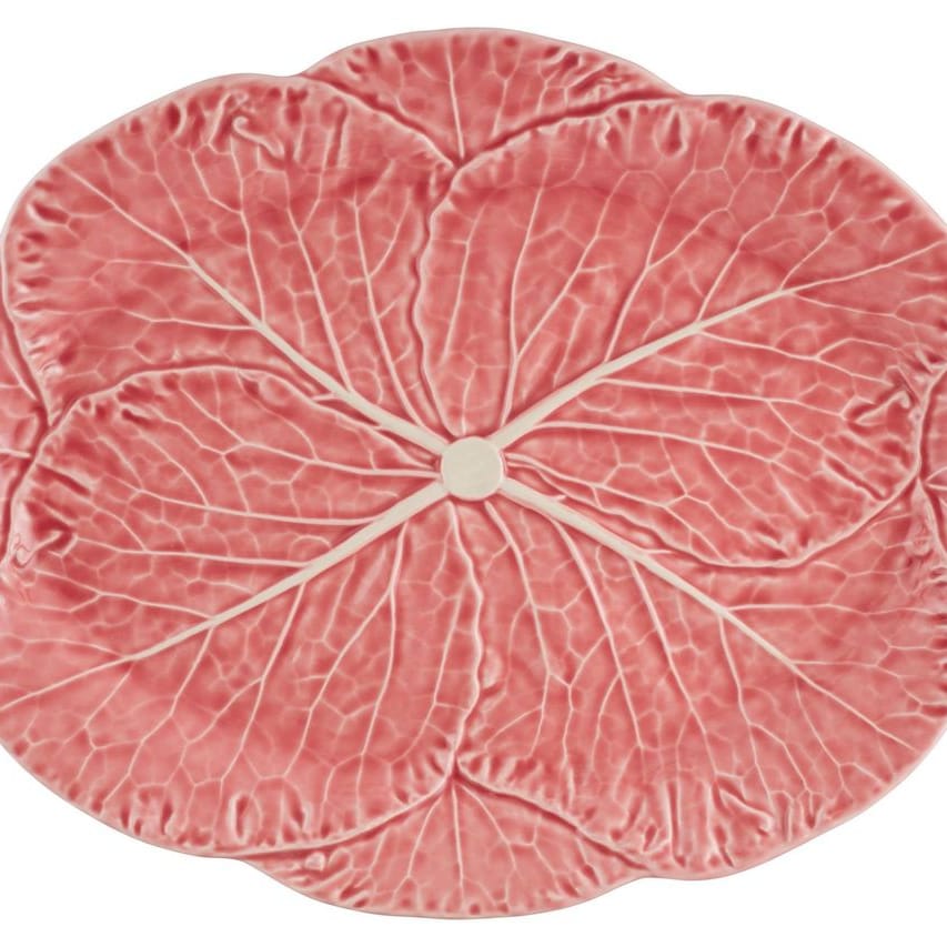 Pink cabbage leaf platter on a white background