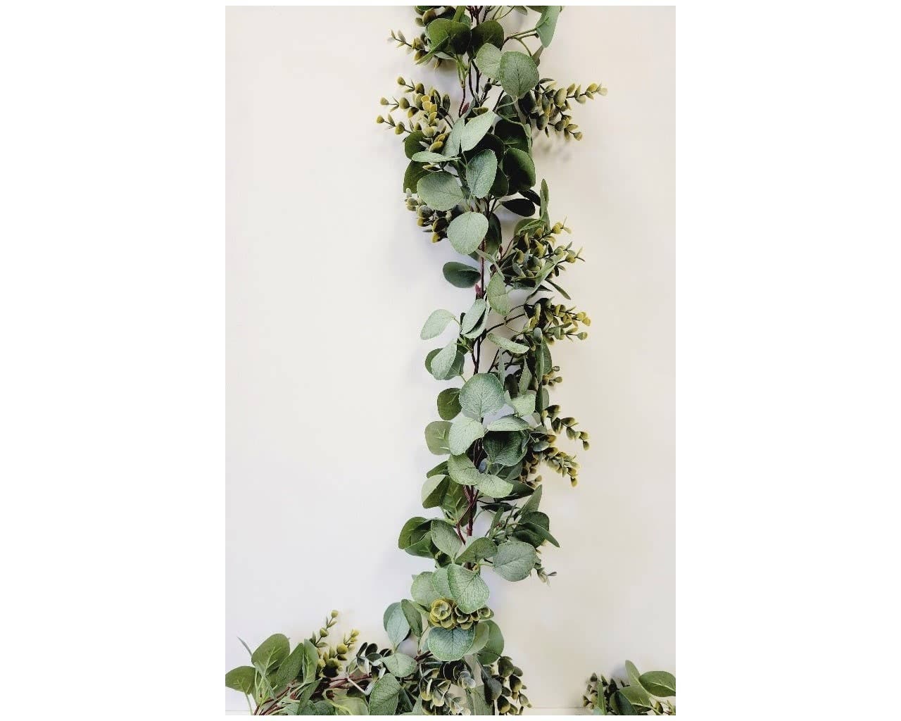 Green leafy garland on a white background 80"