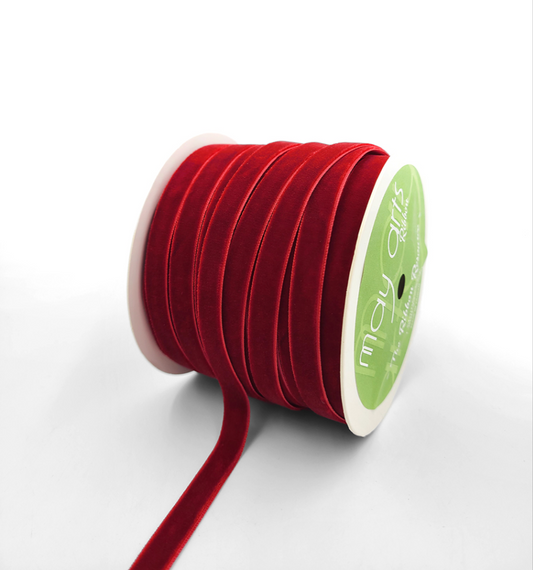 A spool of red velvet ribbon with woven edge, 3/8"