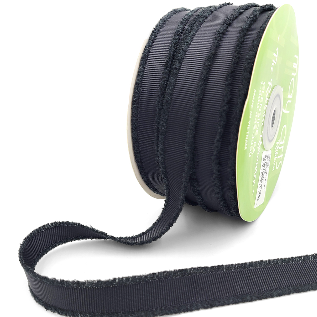 A spool of black fuzzy grosgrain ribbon.