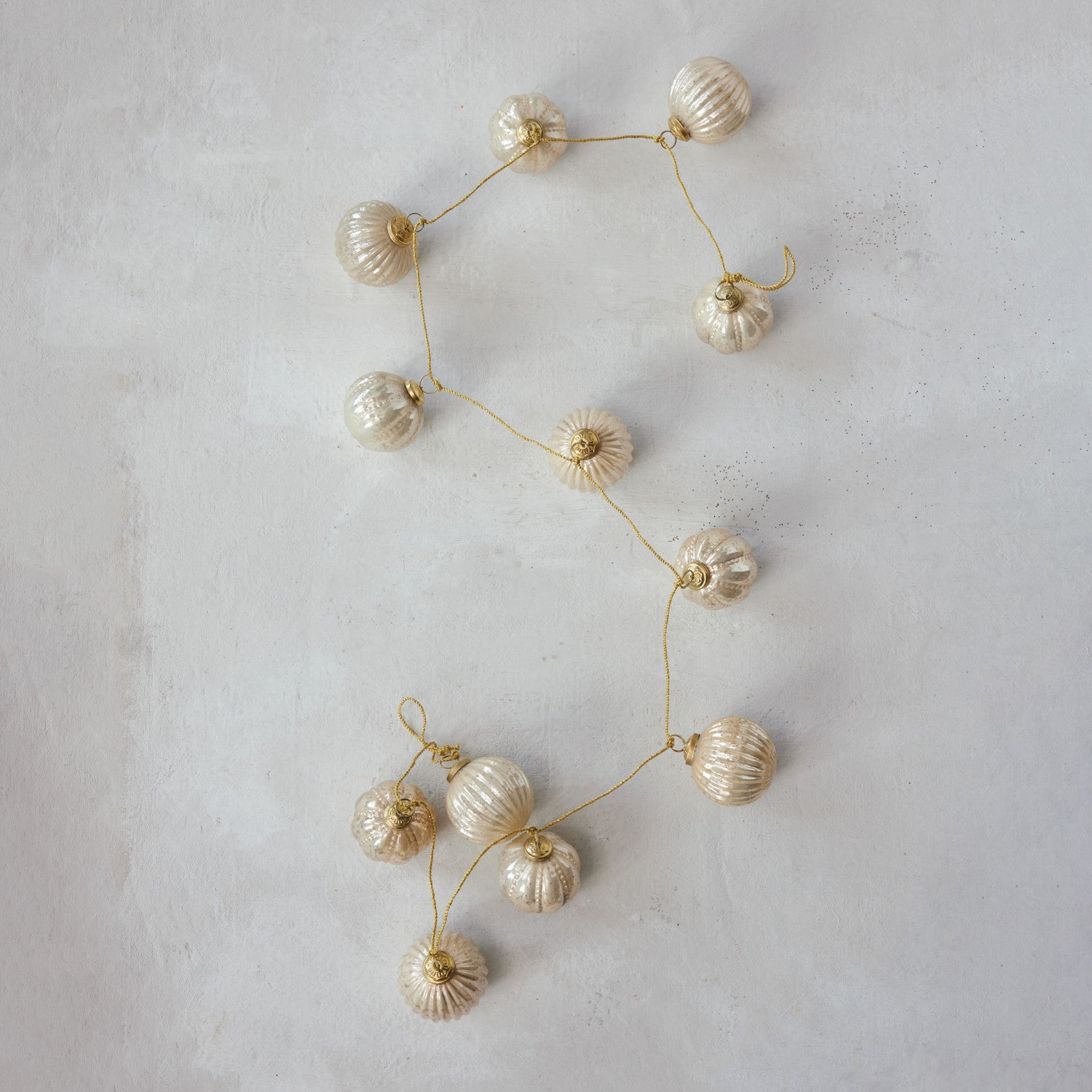 72" Champagne Embossed Mercury Glass Ornament Garland with Gold Cord