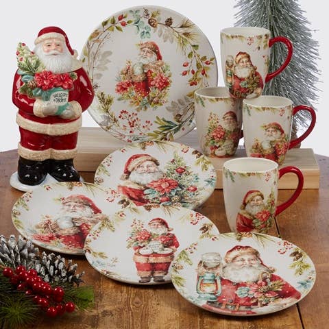 Christmas-themed ceramic tableware set with Santa Claus design on a wooden surface.