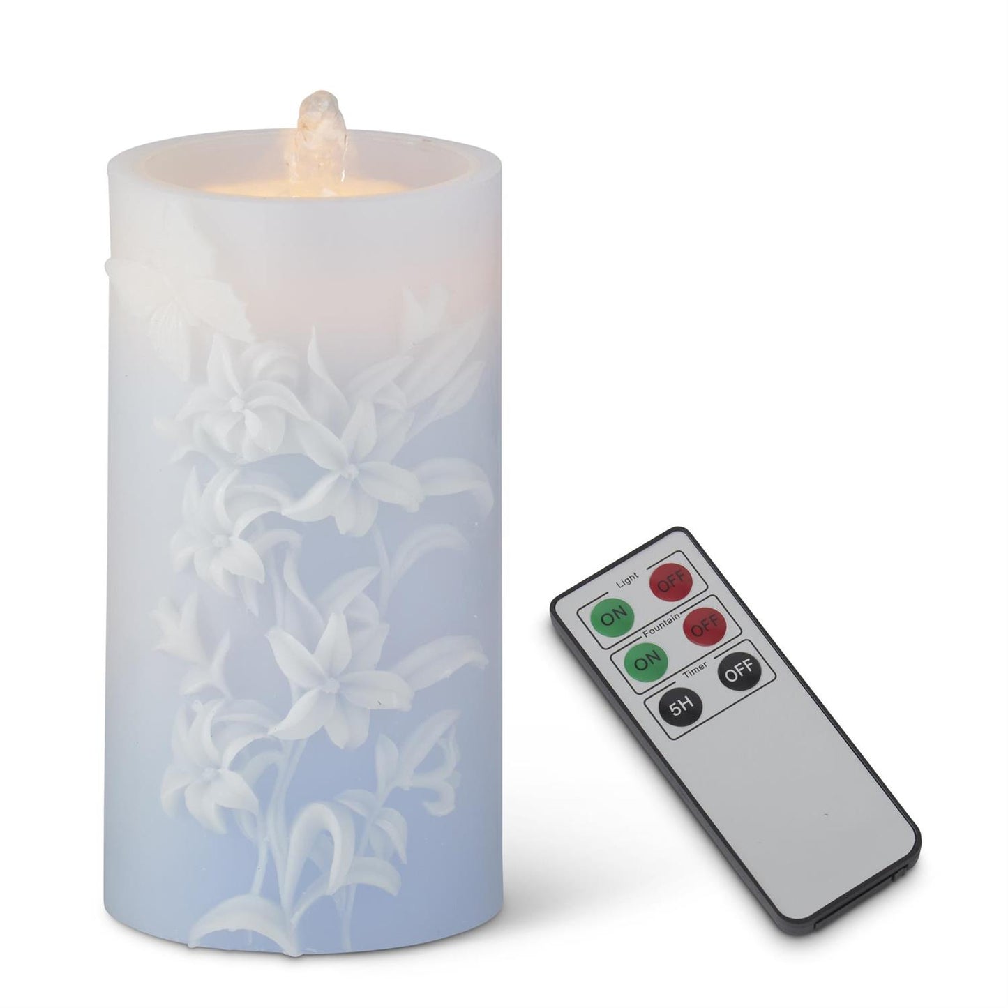 LED candle with floral design and remote control on a white background