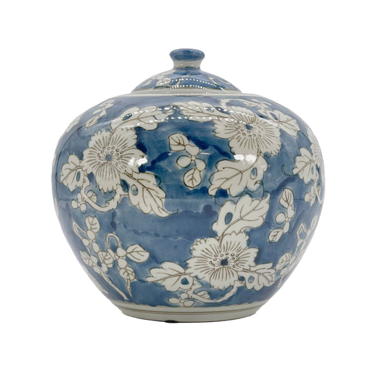 Blue ceramic vase with white floral patterns on a white background Blue & White Chinoiserie Ceramic Jar 8"