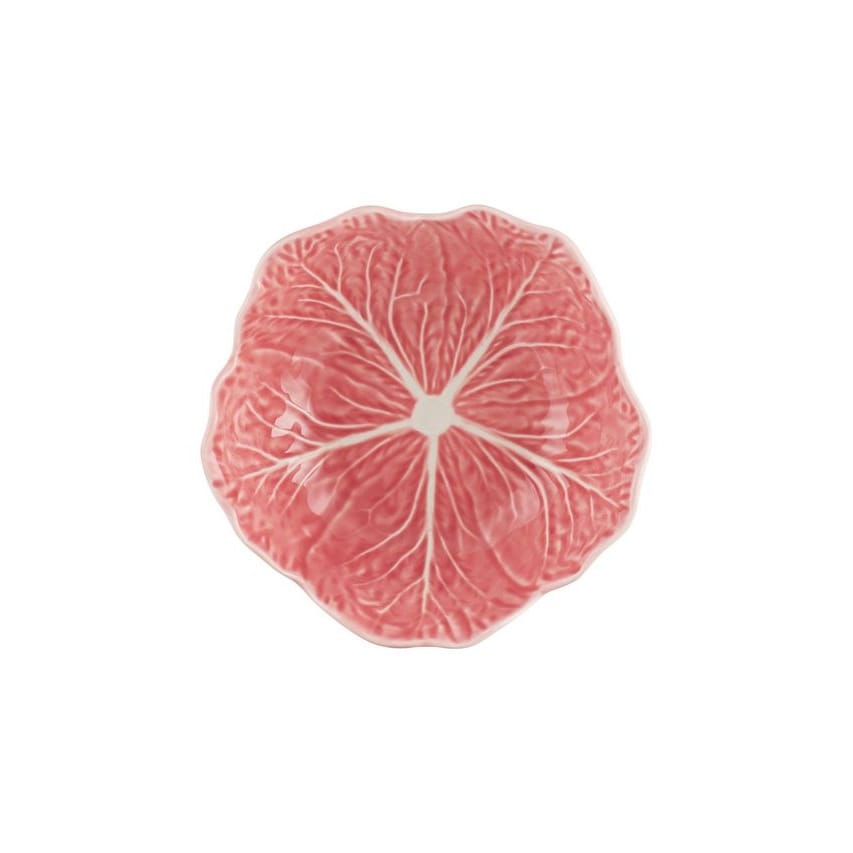 Pink ceramic bowl shaped like a cabbage leaf on a white background