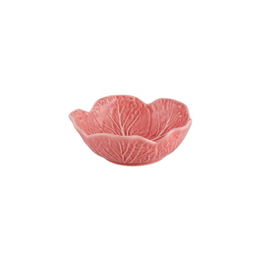 Pink ceramic bowl with cabbage leaf pattern on a white background