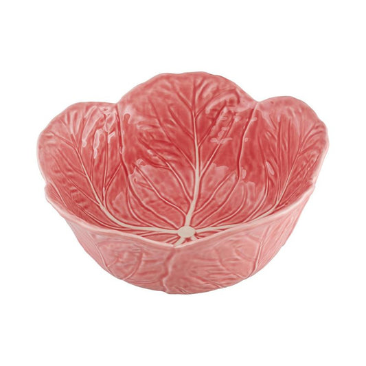 Pink ceramic bowl shaped like a cabbage leaf on a white background