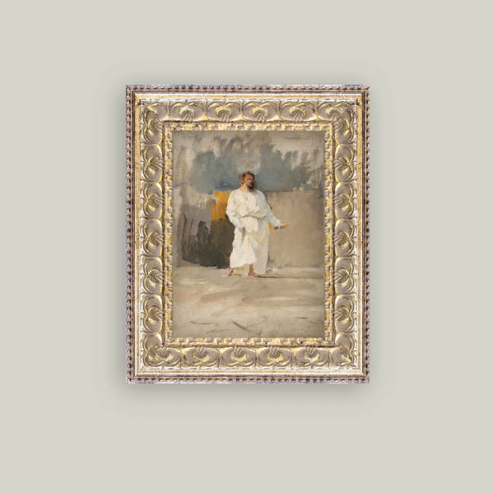 Framed painting of Christ on a light gray wall