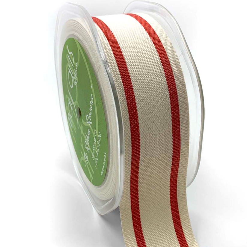 Spool of ribbon with red and beige stripes on a white background