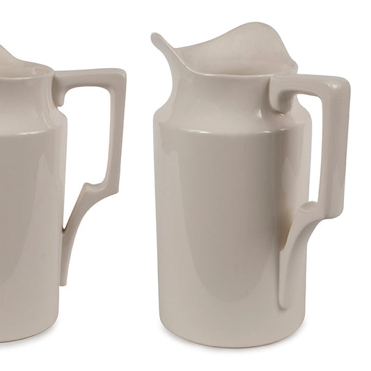 A set of three stoneware pitchers in a beige color, displayed from different angles showing the side, front, and back.