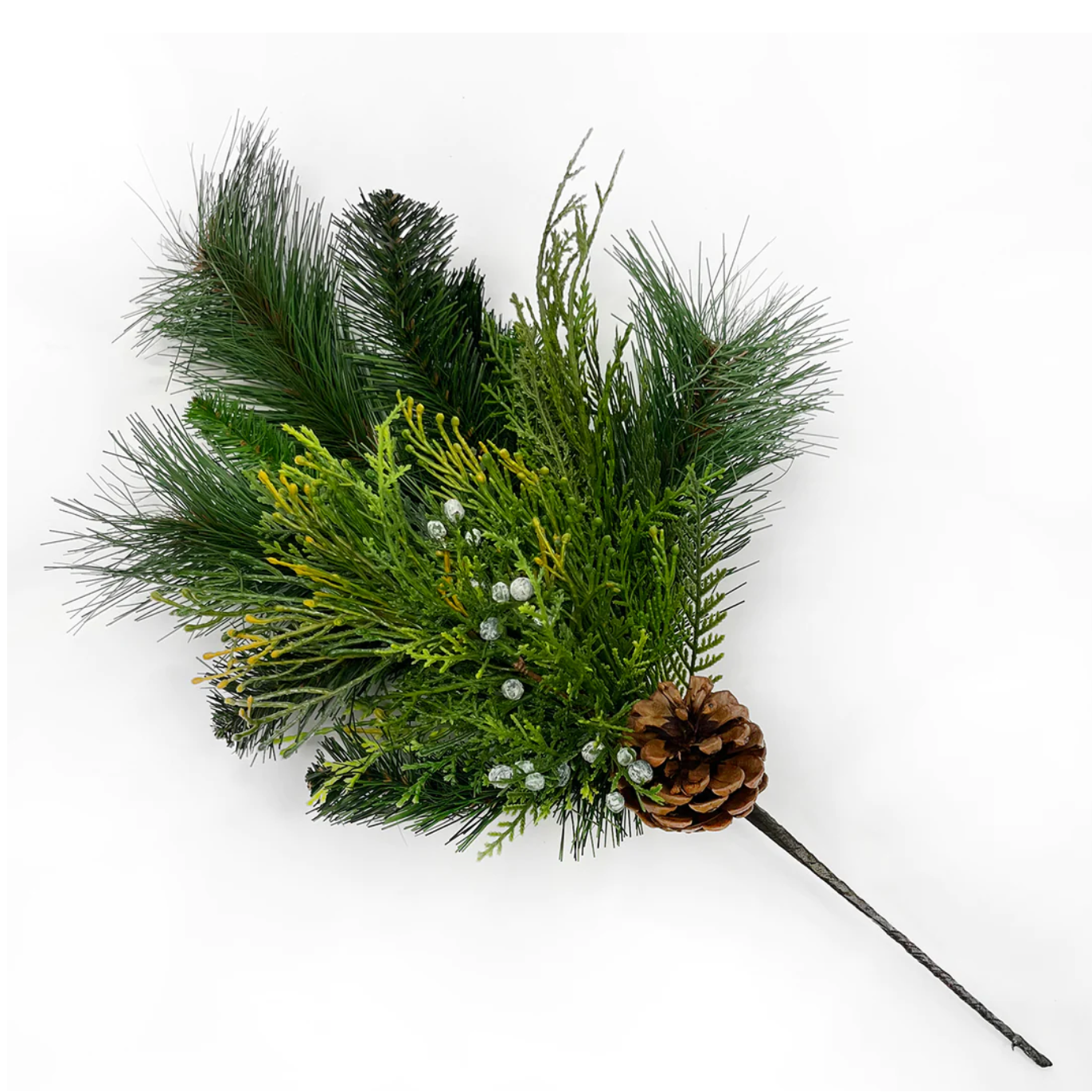 Decorative arrangement of greenery with pinecones on a white background