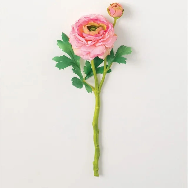 A light pink artificial ranunculus flower stem with green leaves, designed for use in floral arrangements.
