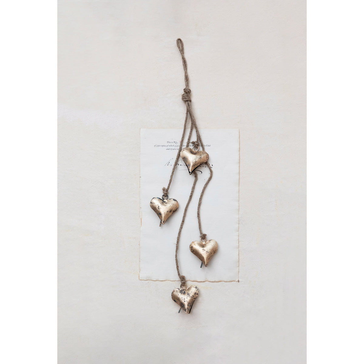 25.75" Metal Hearts on Jute Rope – Antique Brass Finish