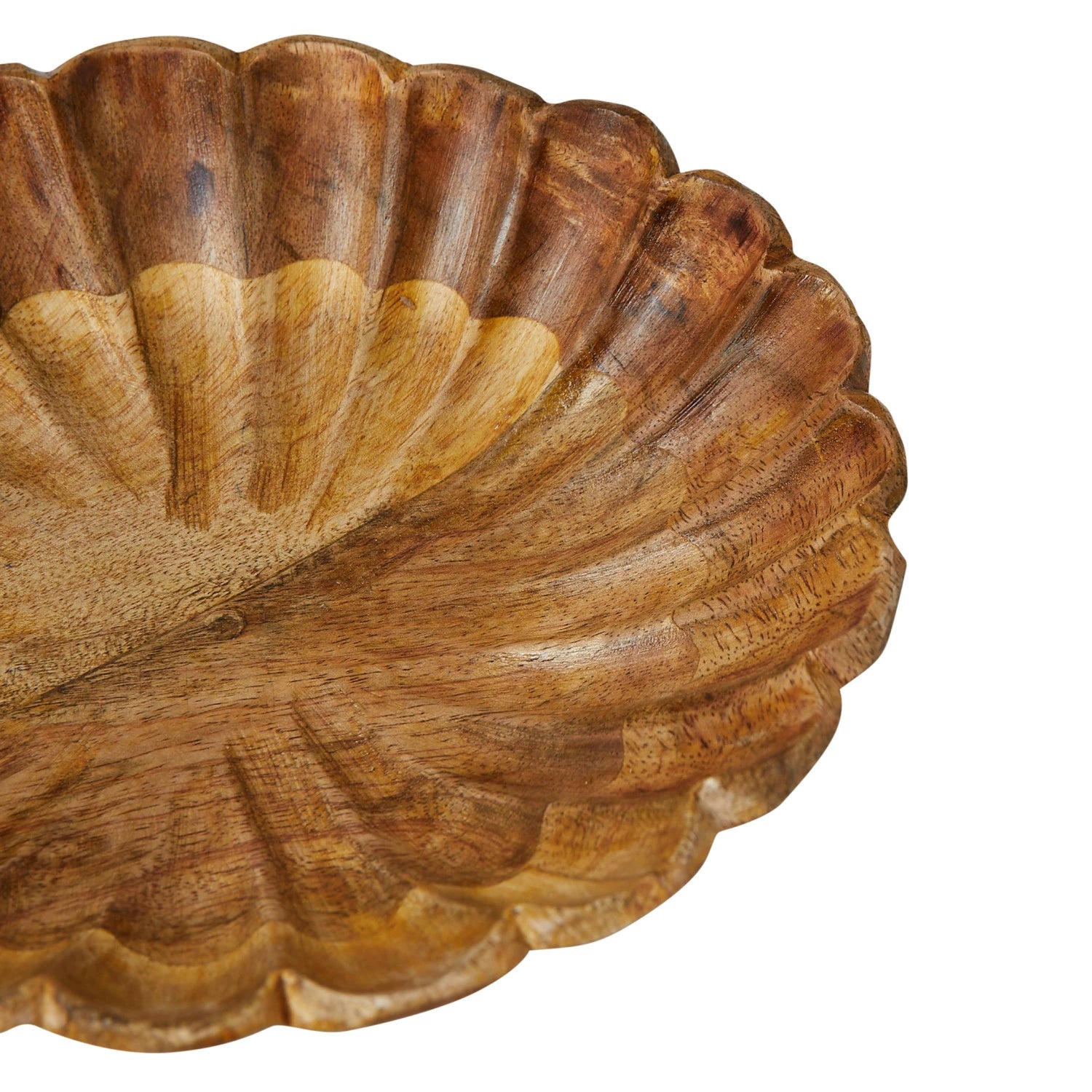 A scalloped edge mango wood bowl with a natural pattern.