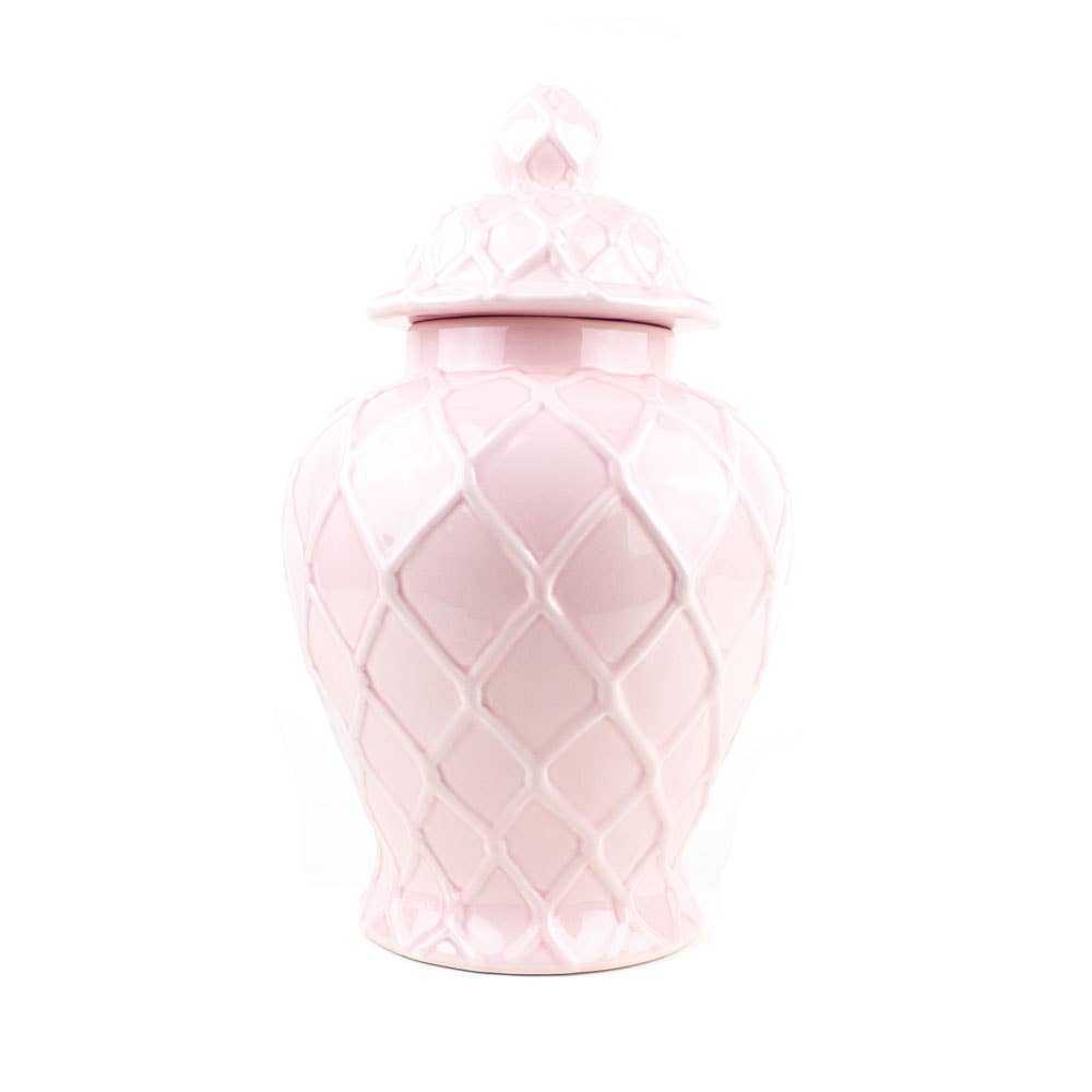 Pink ceramic urn with a textured pattern on a white background