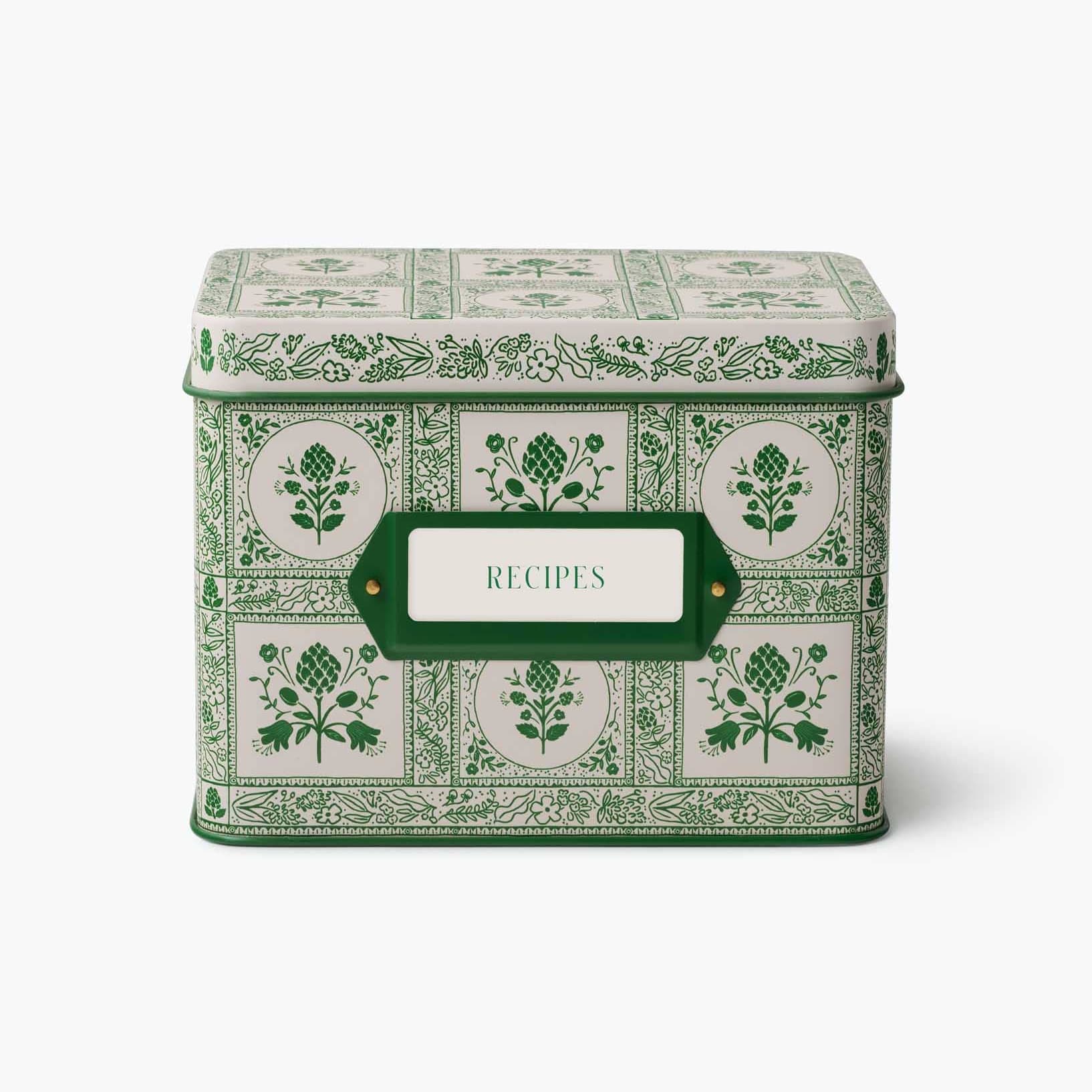Decorative recipe box with green floral patterns and a label on a white background Rifle Paper Co. Artichoke Recipe Tin
