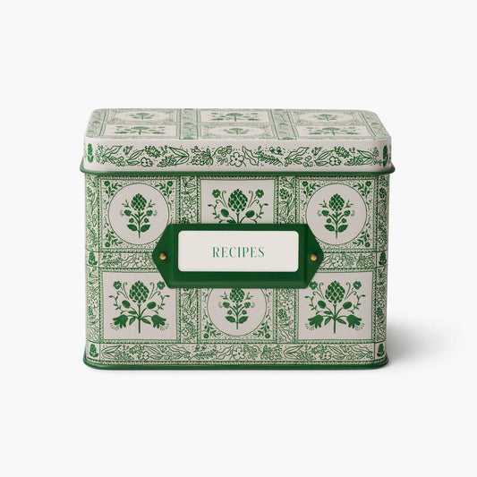 Decorative recipe box with green floral patterns and a label on a white background Rifle Paper Co. Artichoke Recipe Tin