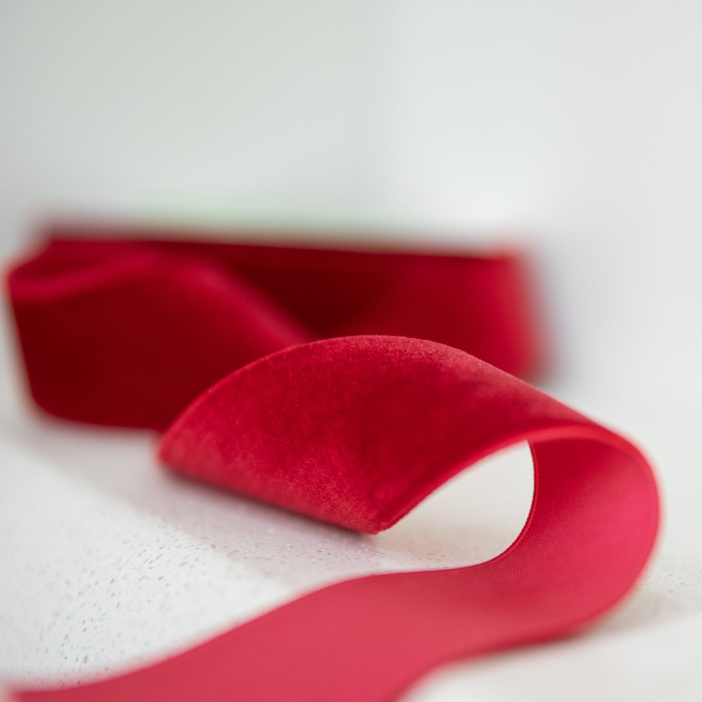 Red ribbon on a white background