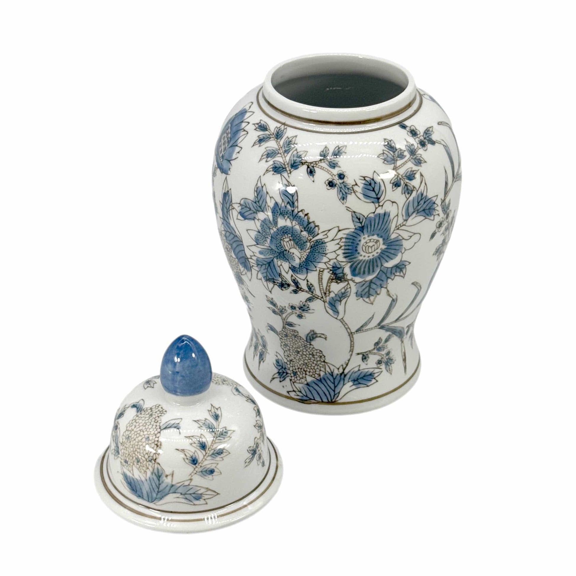 Ceramic jar and cover with blue floral patterns on a white background