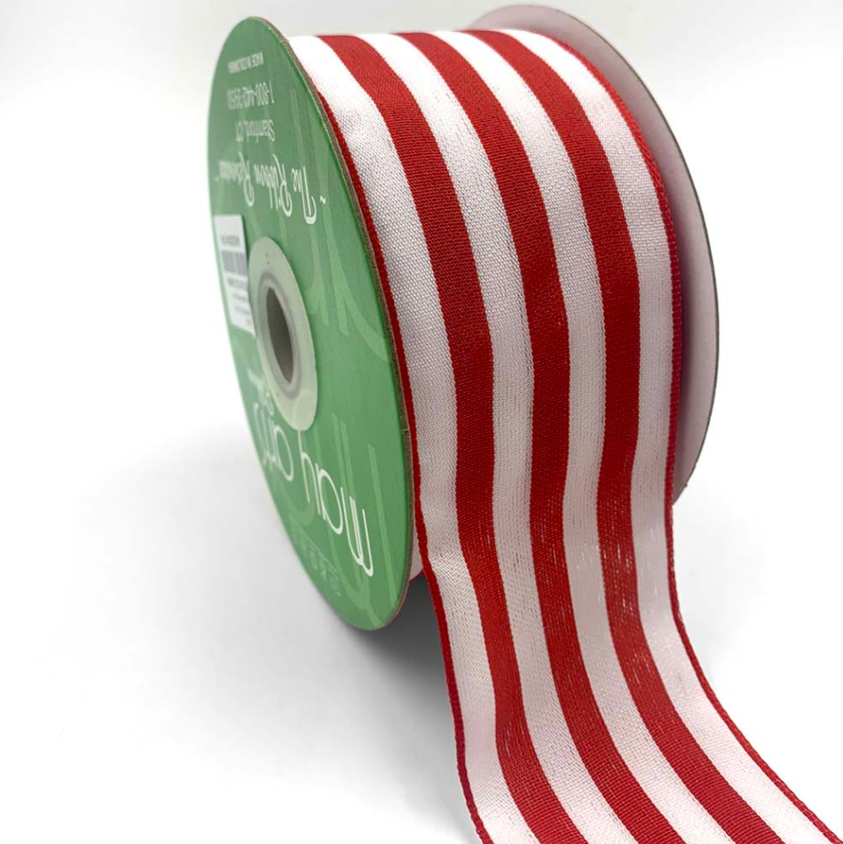 Spool of red and white striped ribbon