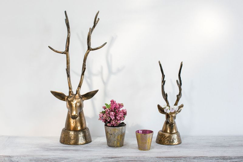 DEERHEAD from Evolution Home decor makes for a rustic decorative piece for deer lovers and hunters.