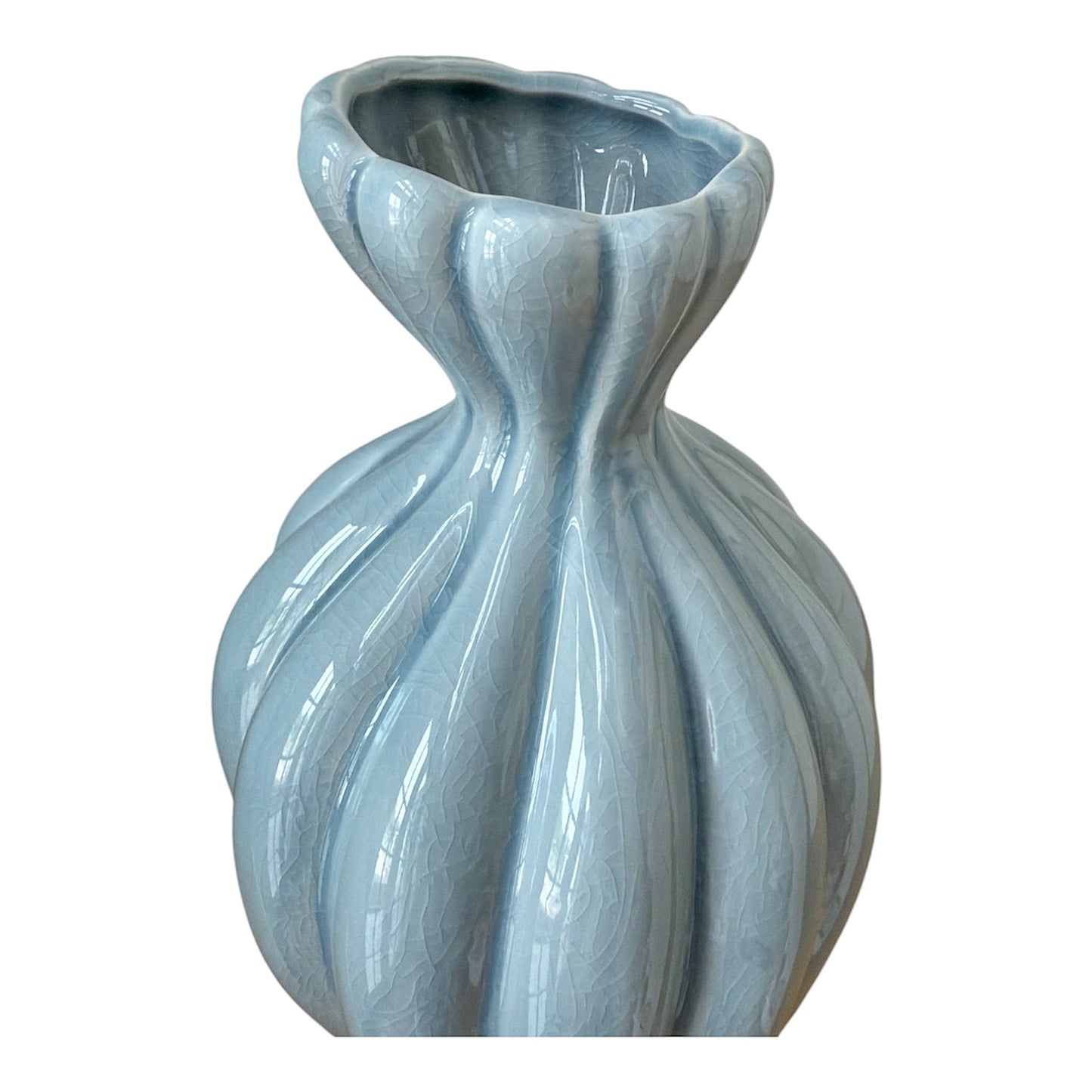 Blue ceramic vase with textured design on a white background