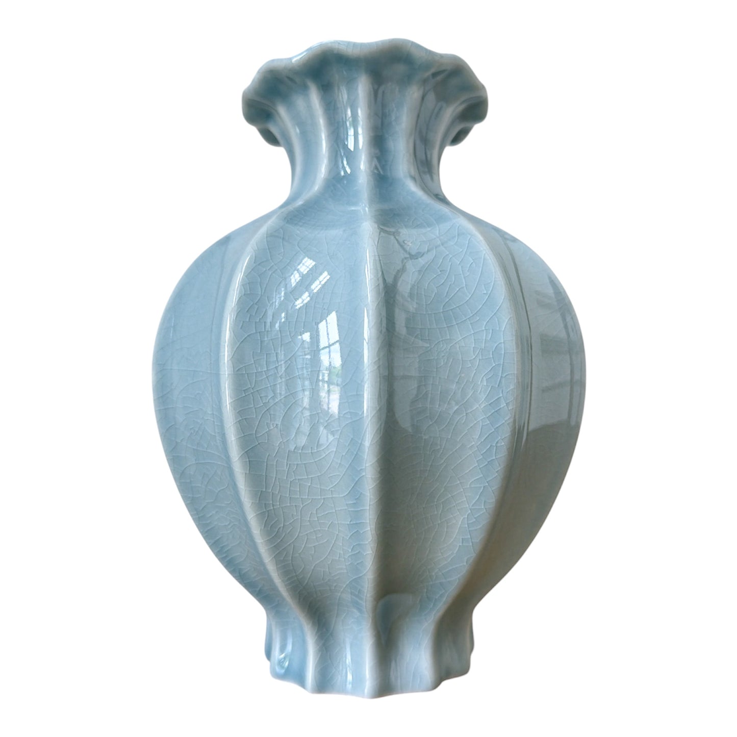 light blue fluted small ceramic vase with 