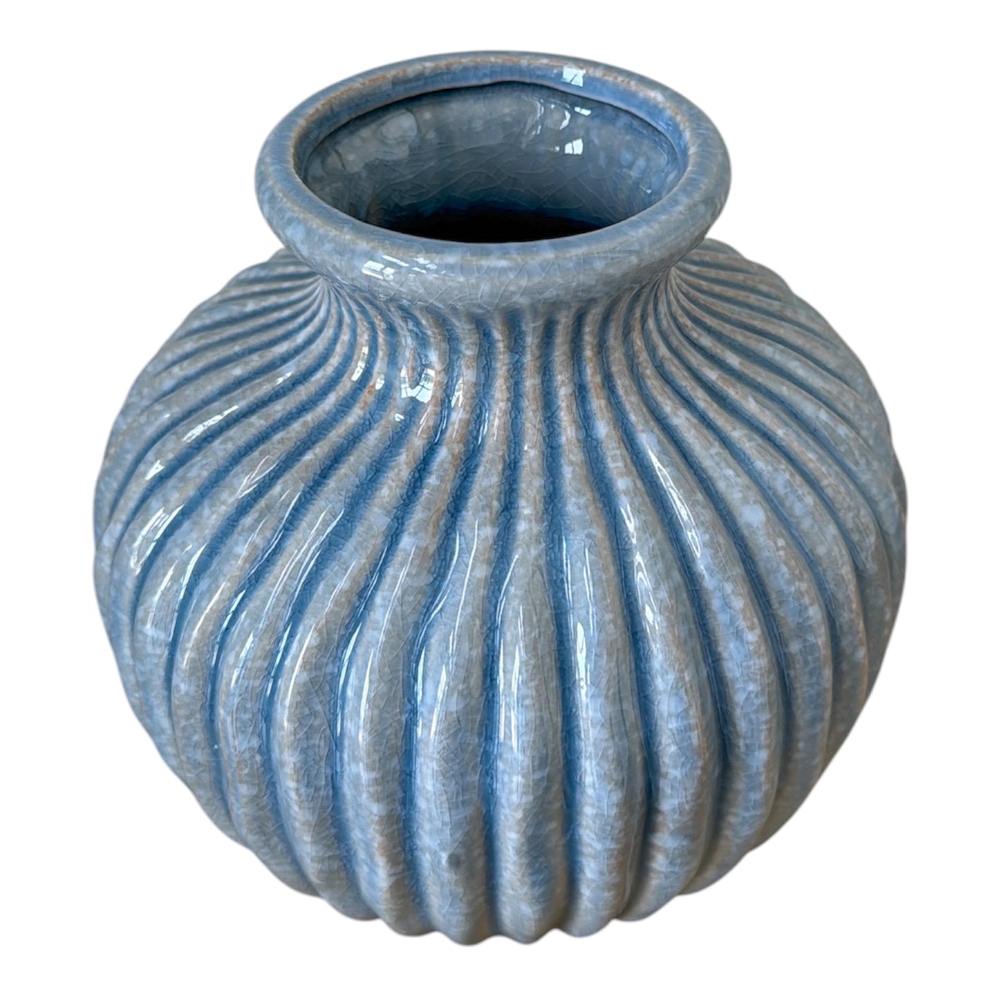 Blue ribbed ceramic vase on a white background