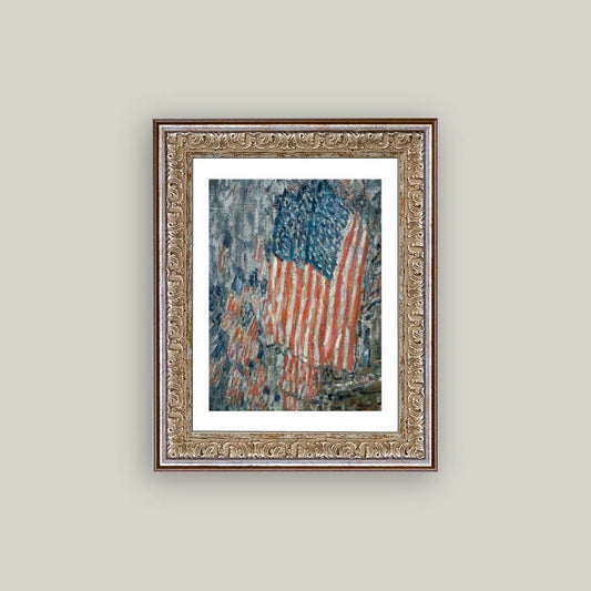 Framed artwork of an American flag on a beige wall