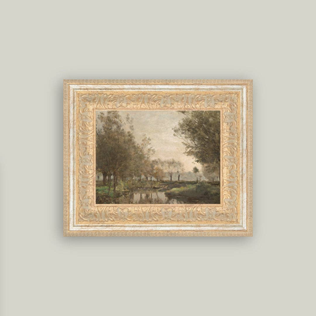 Framed artwork of a landscape with trees and a pond on a light gray wall.